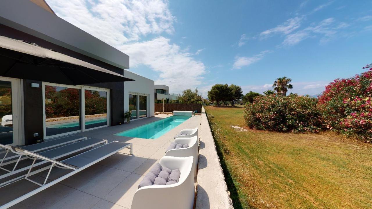 Apartamentos Y Villas Oliva Nova Golf Resort Bagian luar foto